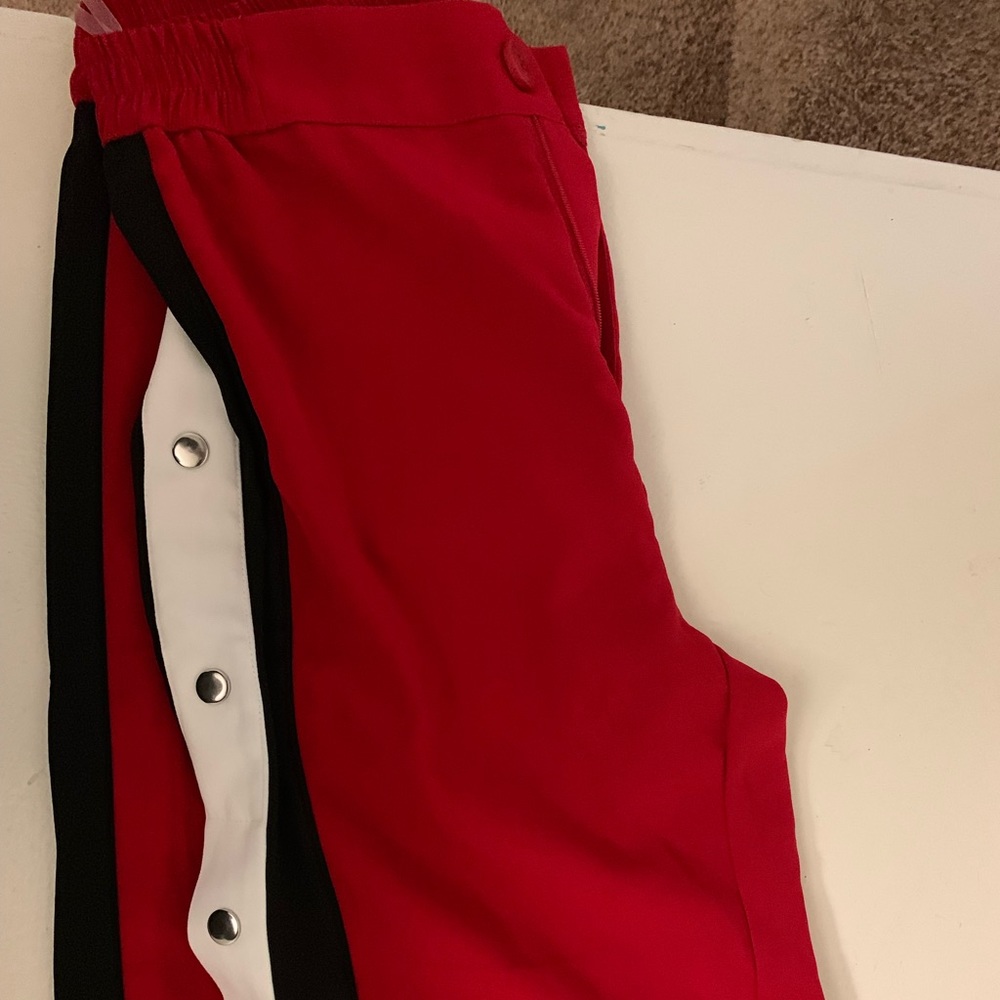 Red pants with stripes